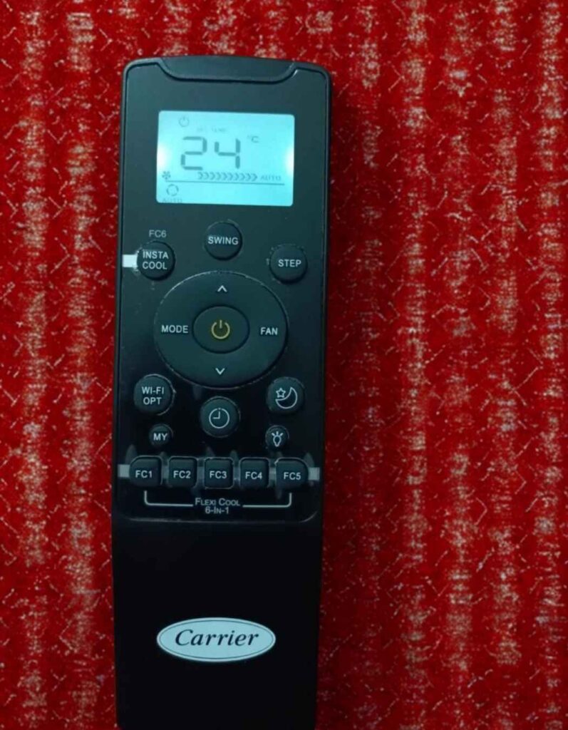 Carrier AC Remote displaying current 24°C temperature in the indoor unit