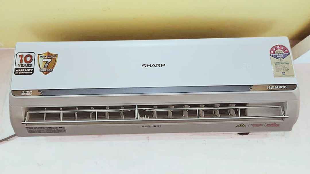 Front view of Sharp 1.5 Ton 5 Star split AC indoor unit (AH-SI18V5B-GC) with the air outlet flap