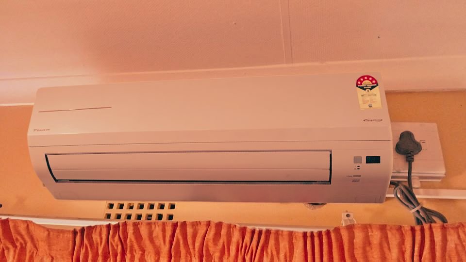 Daikin 1.5 Ton 5 Star Inverter Split AC MTKM50XV16 indoor unit close-up view right side triple LED display panel with operation mode, temperature, and timer indicators